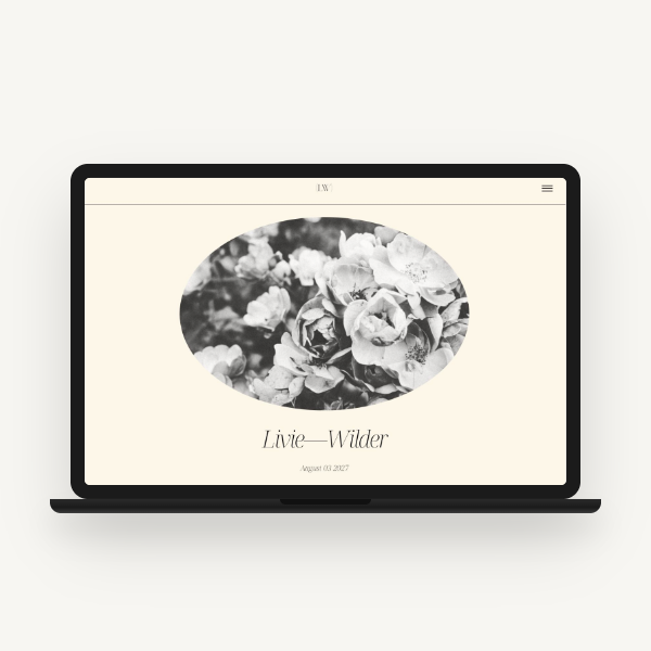     Minimalist wedding website displayed on a laptop featuring a black-and-white floral image and elegant typography.